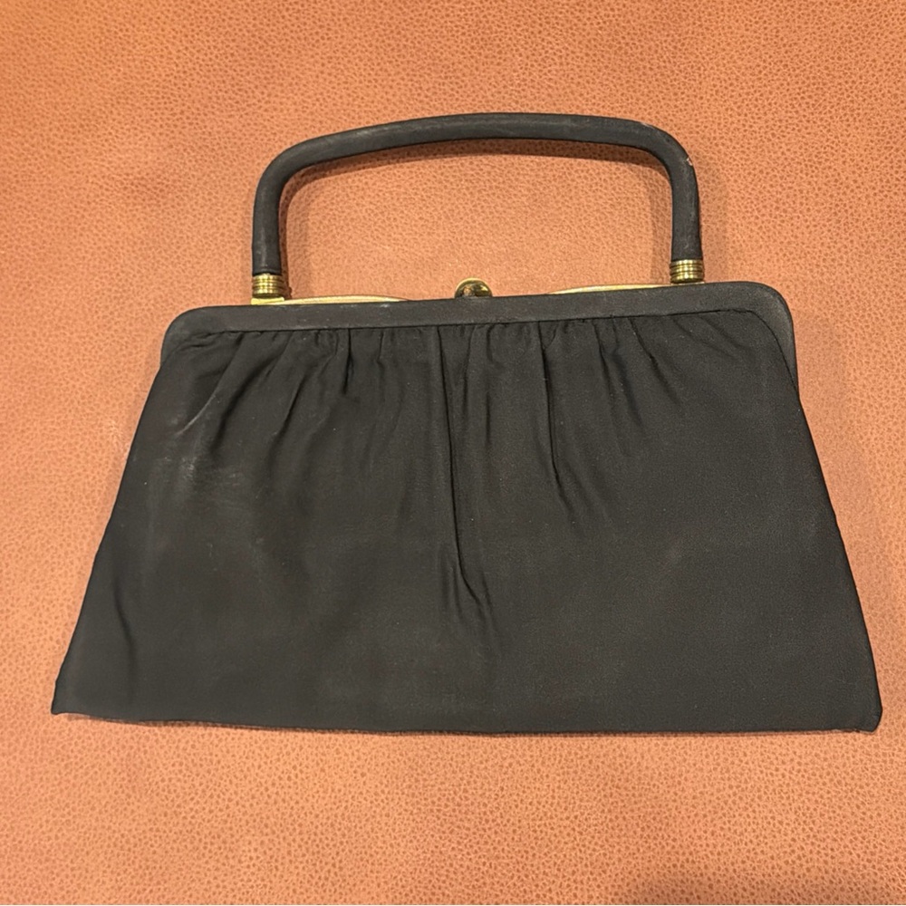 Elegant Black Clutch with Gold Accents